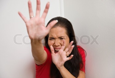 Stock Image -https://www.colourbox.com/image/young-woman-is-afraid-of-violence-in-the-family-image-1206352
